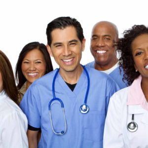 Diverse group of smiling healthcare professionals with stethoscopes.